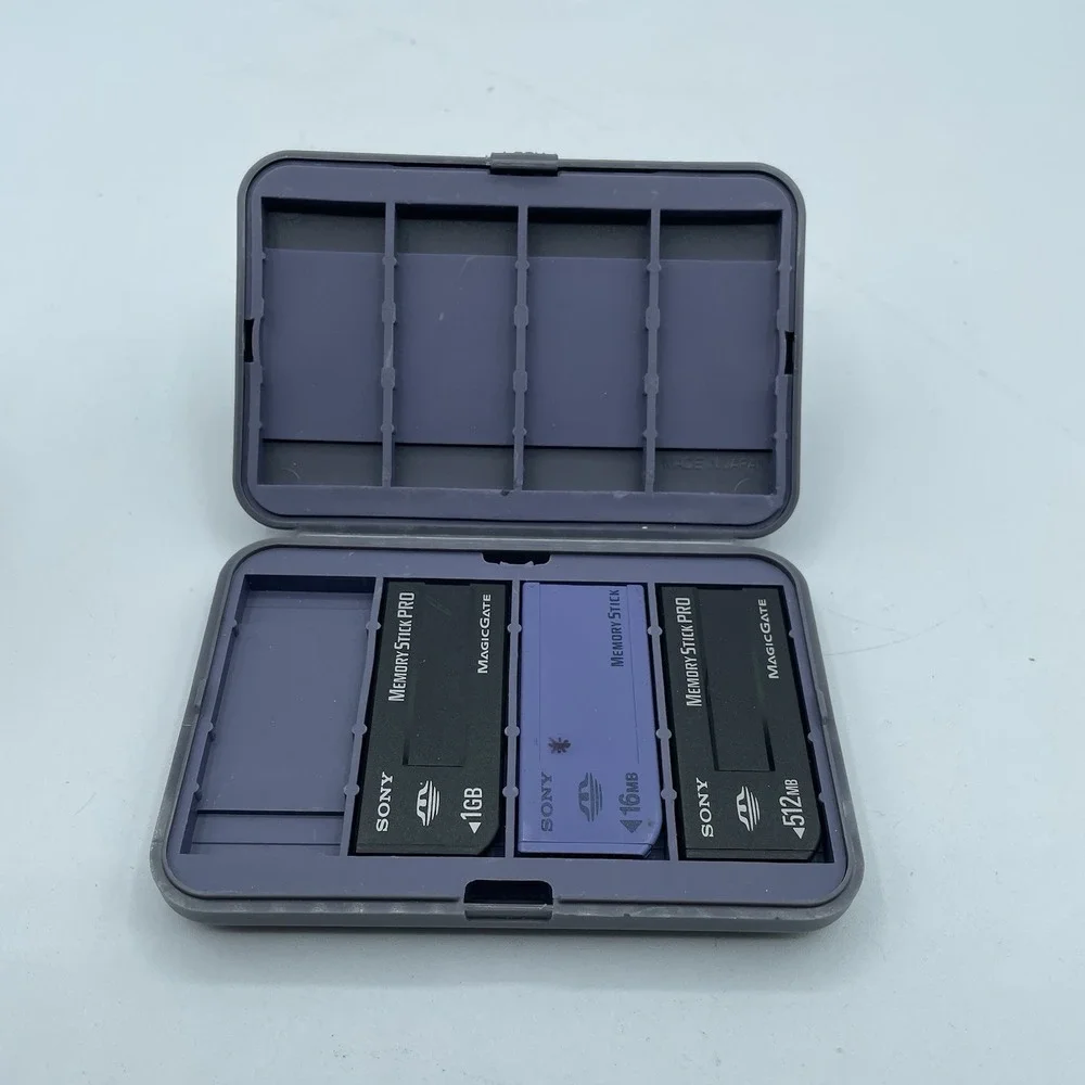 Sony Memory Stick 3 Card Lot (16MB, 512MB, 1 GB) + Case & Sony MRW62E-T Reader